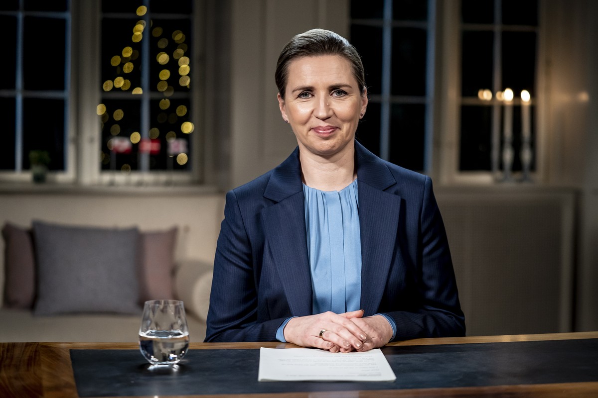 epa09662984 Denmark's Prime Minister Mette Frederiksen gives her New Year's speech at the Prime Ministers representative housing Marienborg in Kongens Lyngby, Denmark, 30 December 2021 (issu ...