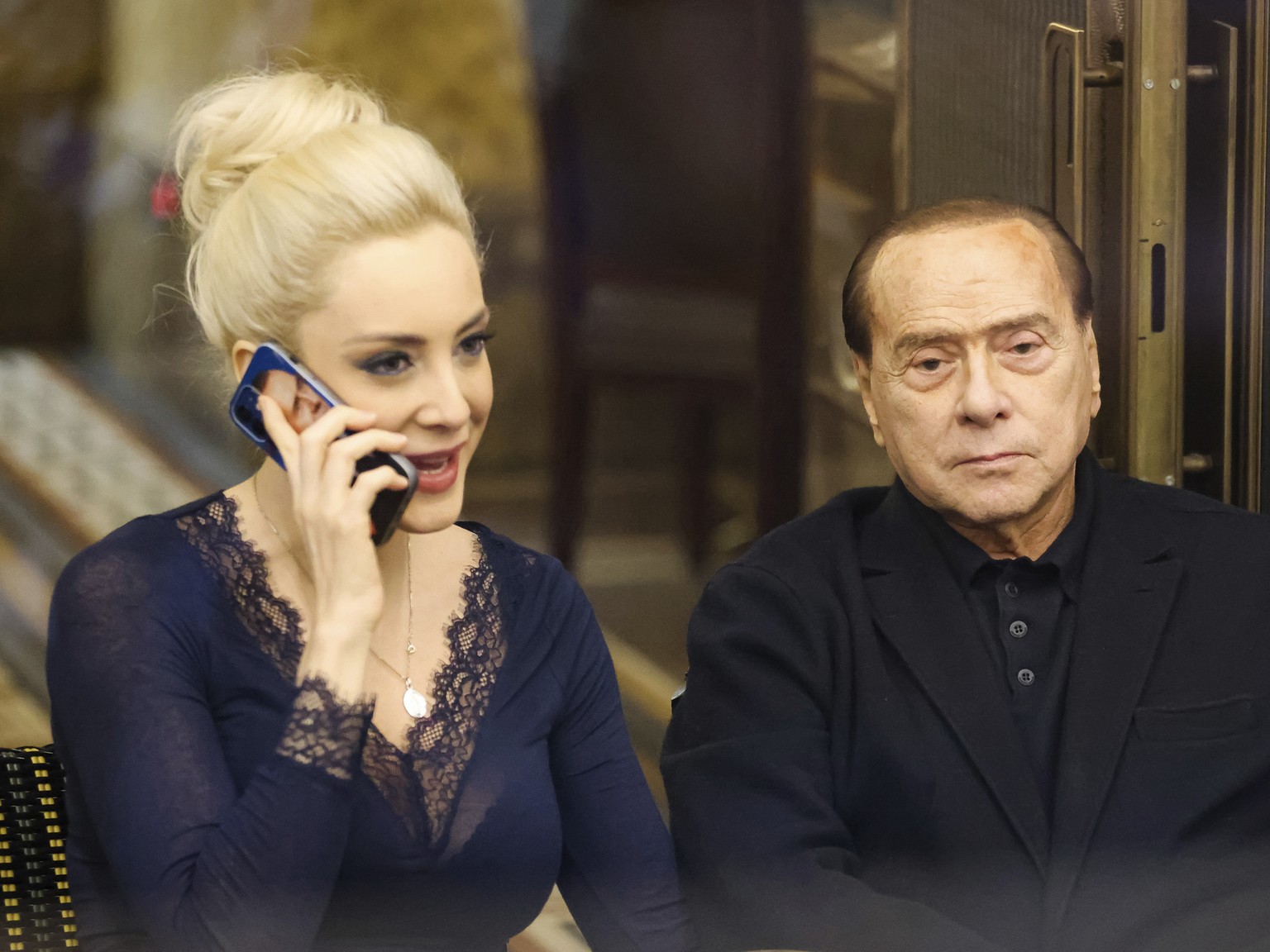 Silvio Berlusconi, right, and his partner Marta Fascina are pictured in Milan, Italy, on Feb. 25, 2022. Italian media are reporting that Silvio Berlusconi, the boastful billionaire media mogul who was ...