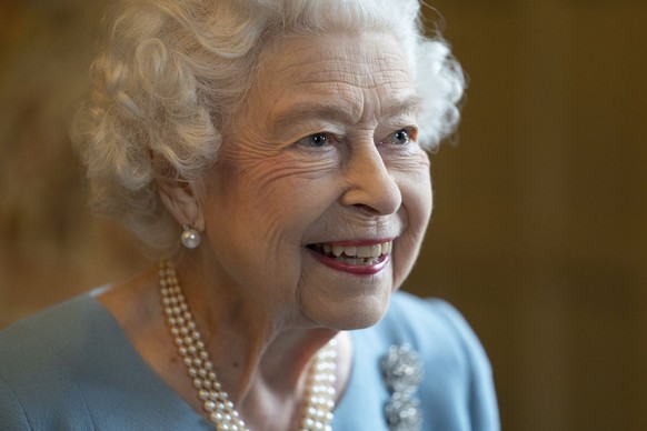 Britain&#039;s Queen Elizabeth II smiles during a reception with representatives from local community groups to celebrate the start of the Platinum Jubilee, at Sandringham House, her Norfolk residence ...