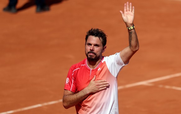 KEYPIX - epa12993028 Stan Wawrinka of Switzerland reacts after losing his Men's 1st round match against Jesper de Jong of the Netherlands at the French Open Grand Slam tennis tournament at Roland ...