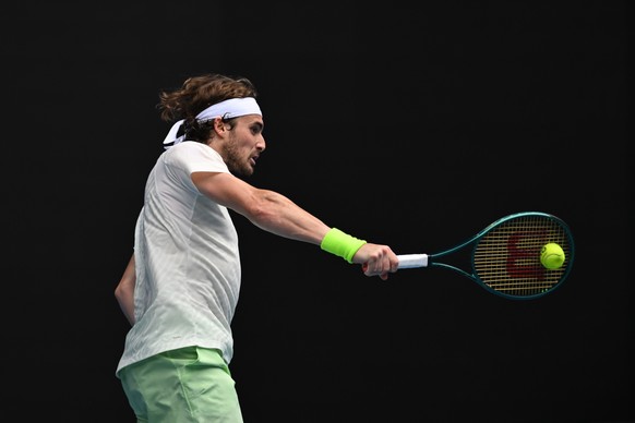 epa11088838 Stefanos Tsitsipas of Greece in action during his 3rd round match against Luca Van Assche of France on Day 6 of the 2024 Australian Open at Melbourne Park in Melbourne, Australia, 19 Janua ...