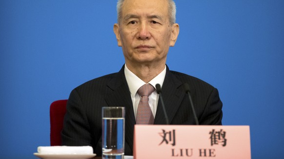 Vice Premier Liu He attends a press conference after the closing session of China&#039;s National People&#039;s Congress (NPC) at the Great Hall of the People in Beijing, Tuesday, March 20, 2018. Chin ...