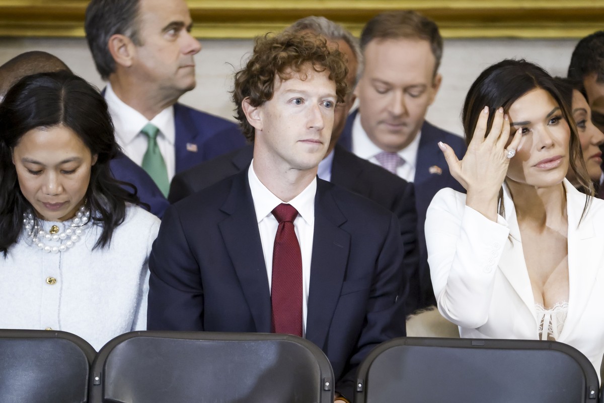 epa11839083 (L-R) Priscilla Chan, Meta CEO Mark Zuckerberg, and Lauren Sanchez, among other dignitaries, attend Donald Trump?s inauguration as the next President of the United States in the rotunda of ...