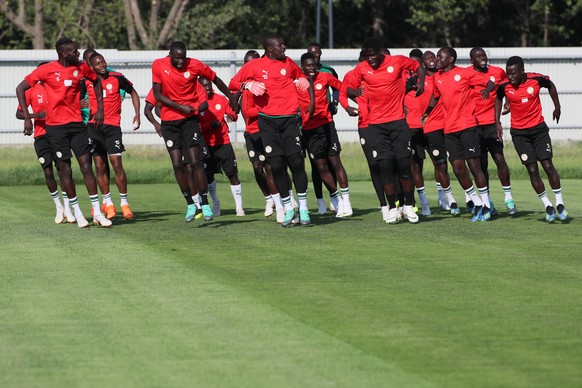 epa06844388 Senegal players sing and dance during a training session outside the Cosmos Arena in Samara, Russia, 27 June 2018. Colombia will face Senegal in their FIFA World Cup 2018 group H prelimina ...