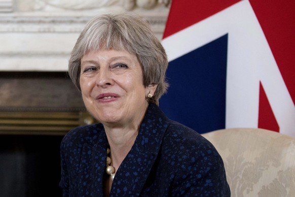 epa06876509 British Prime Minister Theresa May talks with Austrian Chancellor Sebastion Kurz (not pictured), during their meeting inside of No.10 Downing Street in London, Britain, 09 July 2018. EPA/R ...