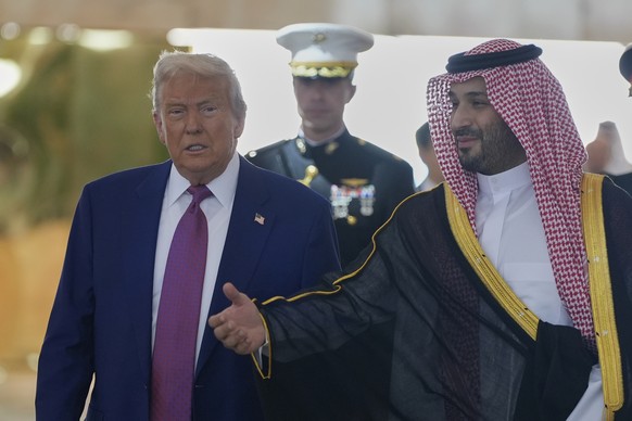 Saudi Crown Prince Mohammed bin Salman welcomes President Donald Trump during an arrival ceremony at the Royal Terminal of King Khalid International Airport in Riyadh, Saudi Arabia, Tuesday, May 13, 2 ...