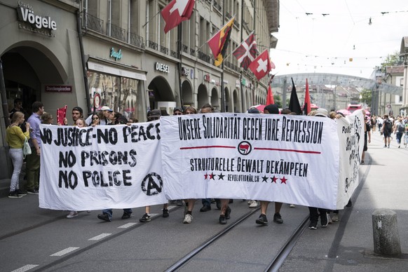 epa06089101 People carrying a banner reading &#039;Our Solidartity Against Repression - Fight against Institutional Violence&#039; as they gather to show solidarity with the arrested demonstrators dur ...