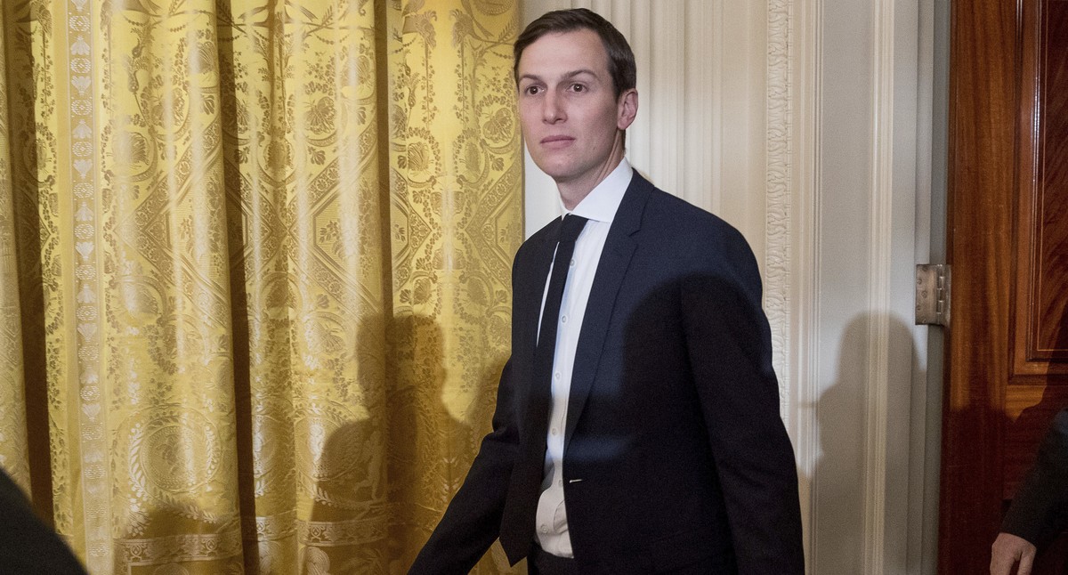 FILE - In this Sunday, Jan. 22, 2017, file photo, President Donald Trump's White House Senior Advisors Jared Kushner, left, and Steve Bannon, right, arrive at a White House senior staff swearing  ...