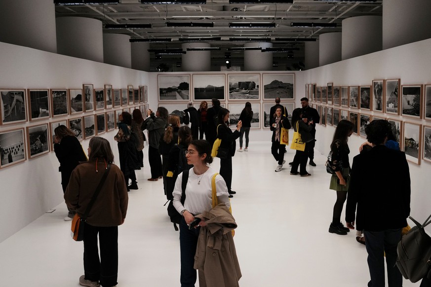 Visitors view photographs at an exhibition of images by Oscar nominated director Yorgos Lanthimos at Onassis Stegi in Athens, Greece, on Friday, March 6, 2026. (AP Photo/Thanassis Stavrakis)
Greece Os ...