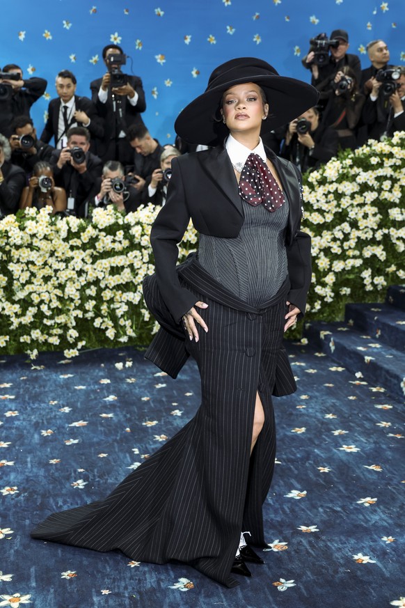 epa12076770 Rihanna poses on the red carpet for the 2025 Met Gala, the annual benefit for the Metropolitan Museum of Art&#039;s Costume Institute, in New York, New York, USA, 05 May 2025. The event co ...