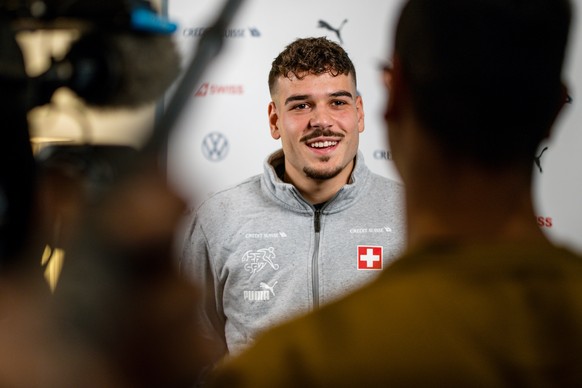 Filip Ugrinic of Switzerland speaks to the media as he arrives for the upcoming UEFA EURO 2024 European qualifying Group I matches against Israel, Kosovo and Romania at the team hotel on Monday, Novem ...