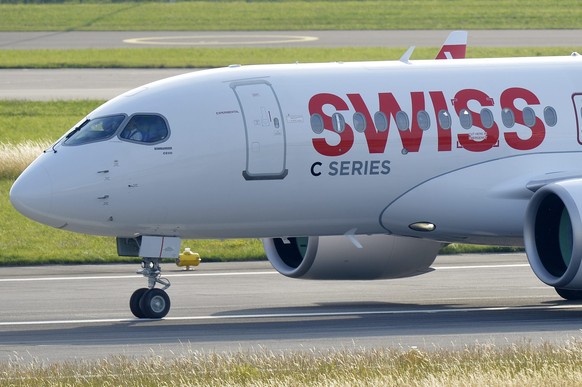 epa04805263 The arrival of the Bombardier CS 100 at Zurich Airport in Kloten in Switzerland on 17, June 2015. As a European premiere at a civil airport the newly developed aircraft has landed in Zuric ...