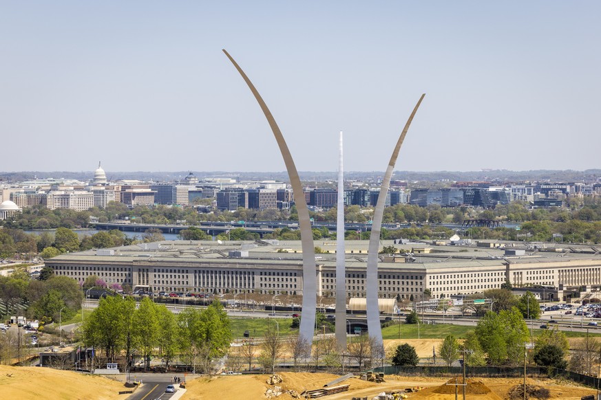 epa10567791 The Pentagon behind the United States Air Force Memorial in Arlington, Virginia, USA, 10 April 2023. Classified military documents that were leaked online ?pose a very serious risk to nati ...