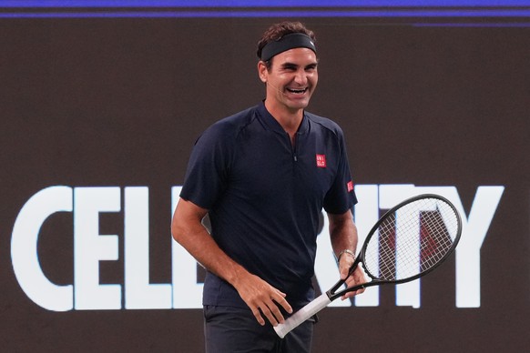 Roger Federer, Swiss former tennis player laughs as he plays at the Roger and Friends Celebrity Doubles with Chinese tennis legend Zheng Jie, Chinese actor Wu Lei, and Hong Kong's actor Donnie Ye ...