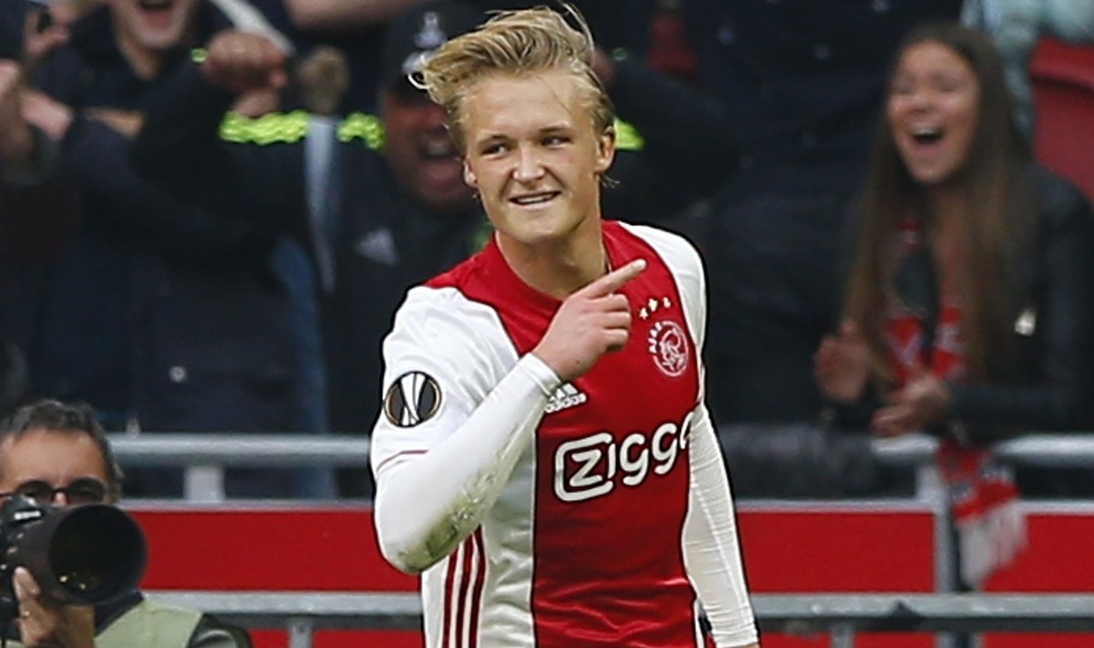 Ajax's Kasper Dolberg celebrates after scoring the second of his team during the first leg semi final soccer match between Ajax and Olympique Lyon in the Amsterdam ArenA stadium, Netherlands, Wed ...