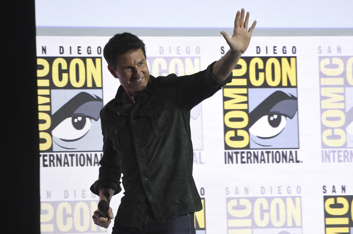 Tom Cruise waves to the audience after presenting a clip from "Top Gun: Maverick" on day one of Comic-Con International on Thursday, July 18, 2019, in San Diego. (Photo by Chris Pizzello/Inv ...