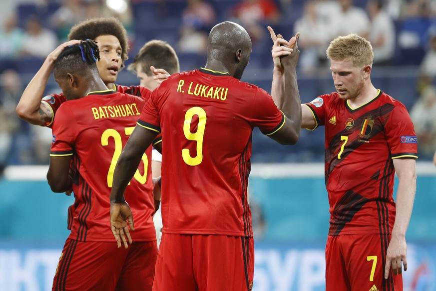 Belgium&#039;s Romelu Lukaku, second right, celebrates with Belgium&#039;s Kevin De Bruyne after scoring his side&#039;s second goal during the Euro 2020 soccer championship group B match between Finl ...