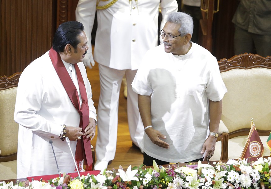 epa08013982 Sri Lankan President Gotabaya Rajapaksa (R) greets his brother, new Prime Minister Mahinda Rajapaksa (L) at the presidential secretariat in Colombo Sri Lanka, 21 November 2019. Mahinda Raj ...