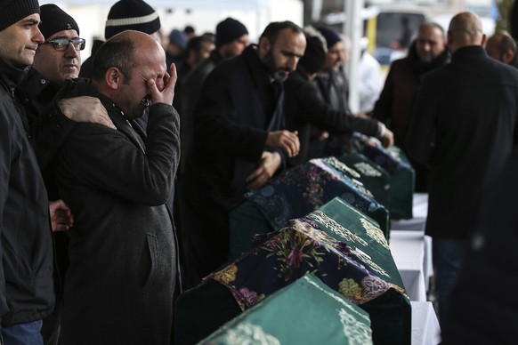 Mourners attend the funeral prayers for nine members of Alemdar family killed in a collapsed apartment building, in Istanbul, Saturday, Feb. 9, 2019. Turkey&#039;s President Recep Tayyip Erdogan says  ...