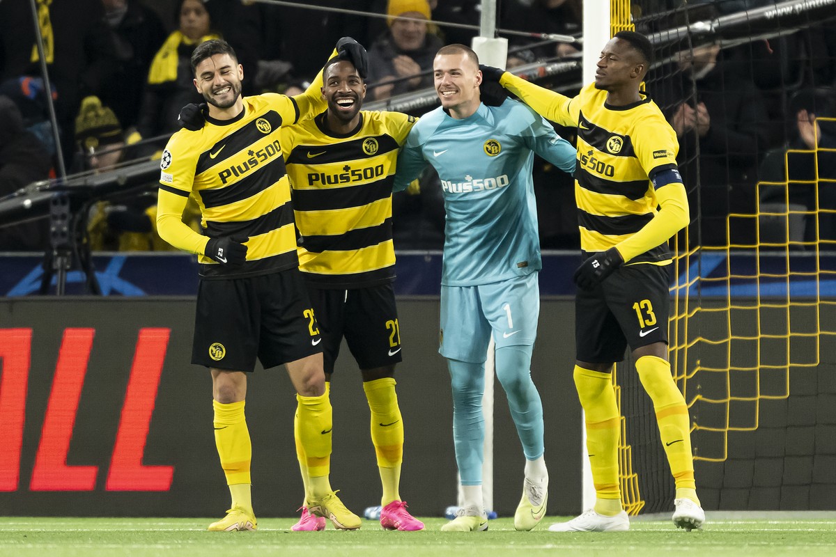 YB's Loris Benito, Ulisses Garciam Goalkeeper Anthony Racioppi and Mohamed Ali Camara, from left to right, celebrate after winning 2-0 during the Champions League group G soccer match between Swi ...