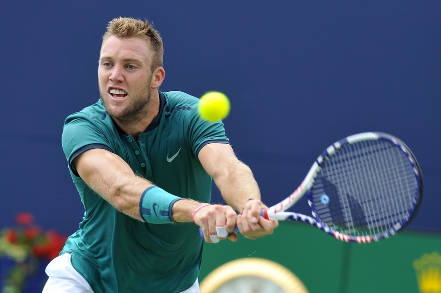 epa05445946 Jack Sock of the USA in action against Stan Wawrinka of Switzerland during the third round of the Rogers Cup Men’s Singles tennis tournament in Toronto, Canada, 28 July 2016. EPA/WARREN TO ...