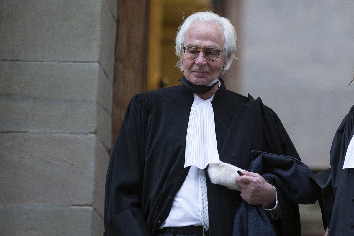Marc Bonnant lawyer of Israeli business man and diamond-magnate Beny Steinmetz (not pictured) waits in front of Geneva's courthouse for a hearing for alleged corruption of Guinean public official ...