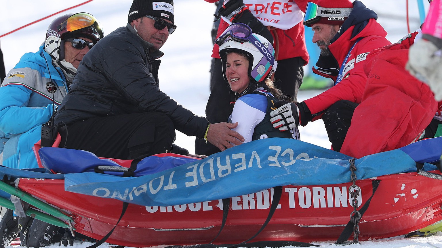 epa08141046 Aline Danioth (C) of Switzerland reacts after crashing during the women&#039;s Parallel Giant Slalom race at the FIS Alpine Skiing World Cup event in Sestriere, Italy, 19 January 2020. EPA ...