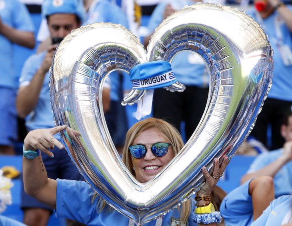 epa06824651 A supporter of Uruguay poses prior to the FIFA World Cup 2018 group A preliminary round soccer match between Uruguay and Saudi Arabia in Rostov-On-Don, Russia, 20 June 2018.

(RESTRICTIO ...