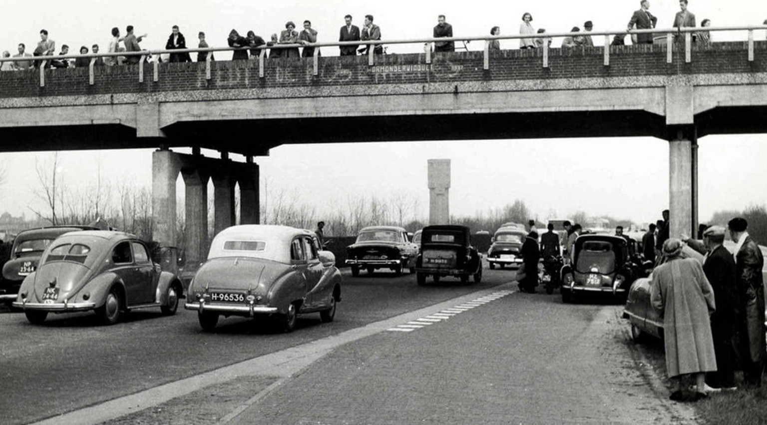 Dutch citizens flock to the highway to witness their country&#039;s first ever &quot;traffic jam&quot; during the Pentecost holiday (Pinksteren) (May 29, 1955) i.imgur.com/SQSLvj...