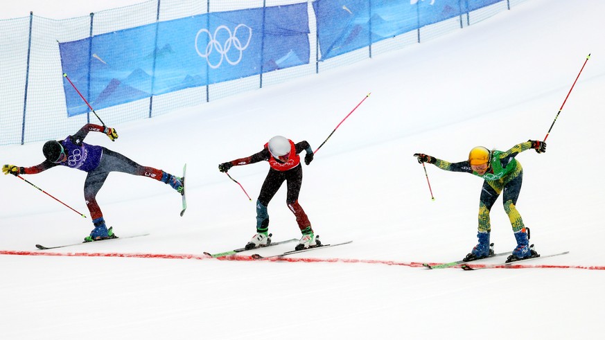 epa09764845 (L-R) Brittany Phelan of Canada, Fanny Smith of Switzerland and Daniela Maier of Germany in action during the Women&#039;s Freestyle Skiing Ski Cross semi final at the Zhangjiakou Genting  ...