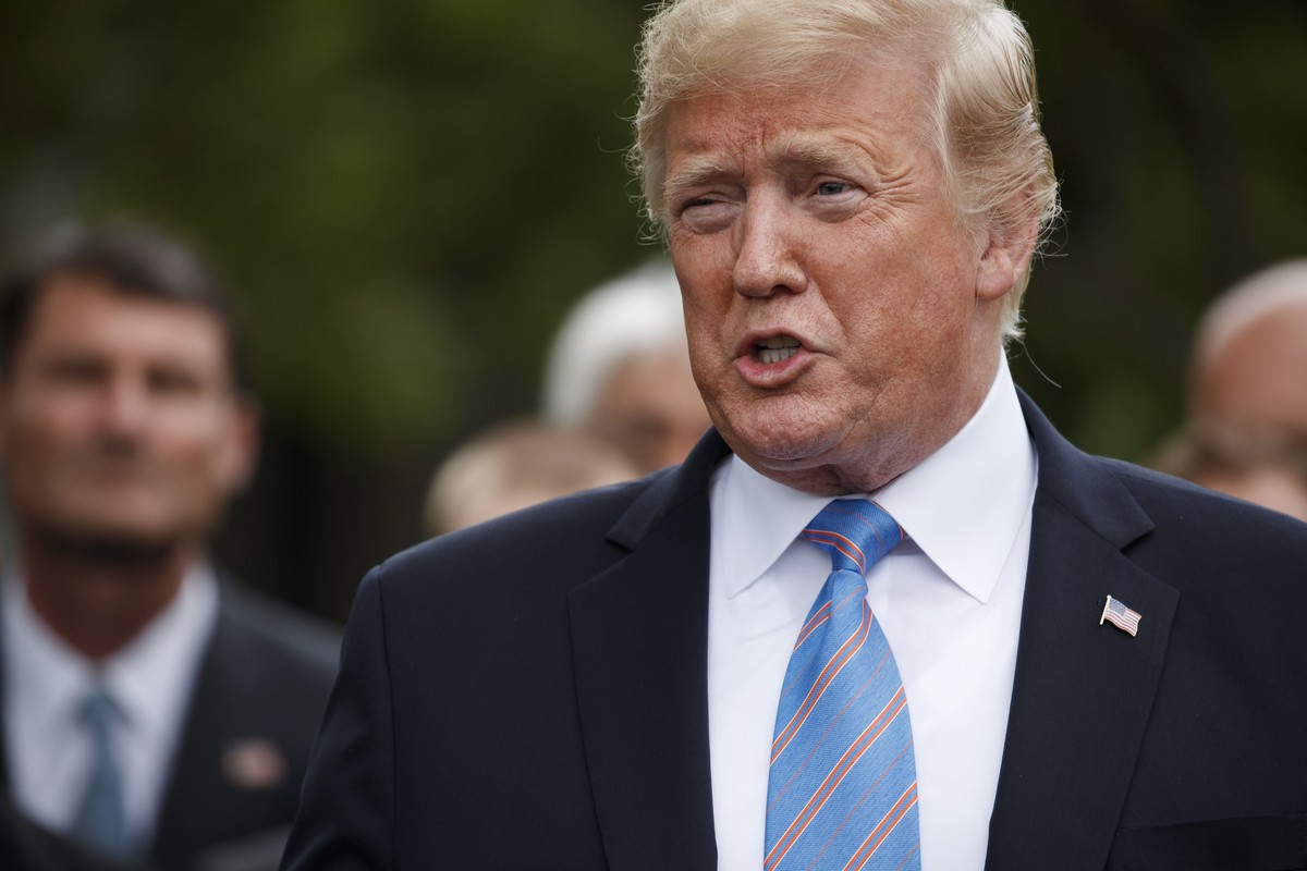 epa07639816 US President Donald J. Trump delivers remarks during a ceremony to greet the 103rd Indianapolis 500 Champions, Team Penske, on the South Lawn of the White House in Washington, DC, USA 10 J ...