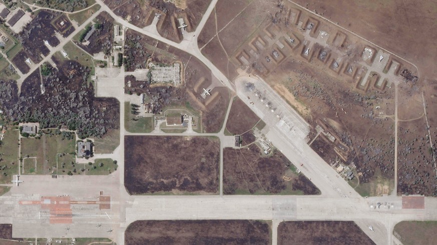 A satellite image by Planet Labs PBC shows Saki Air Base after an explosion there Wednesday, Aug. 10, 2022, in the Crimean Peninsula, the Black Sea peninsula seized from Ukraine by Russia and annexed  ...
