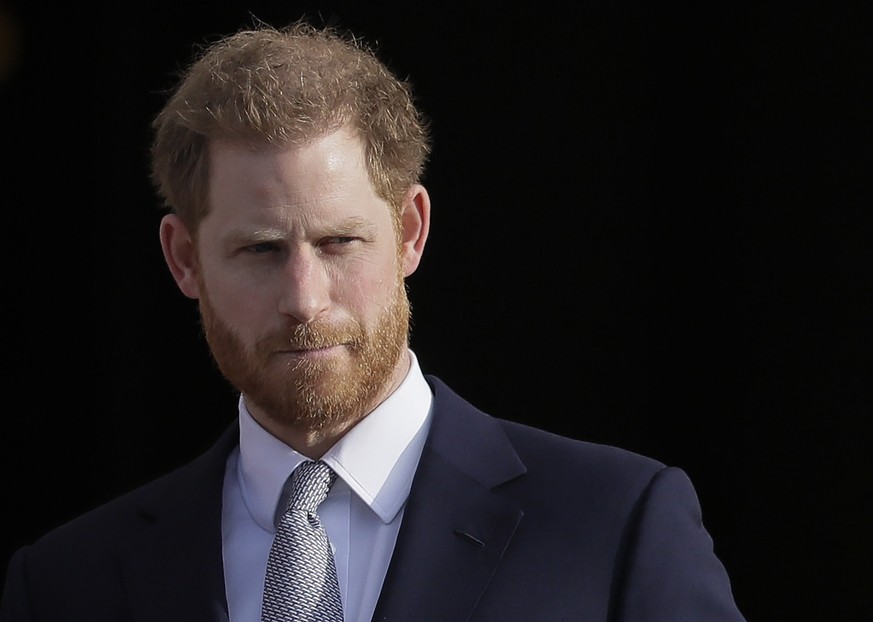 FILE - Britain&#039;s Prince Harry arrives in the gardens of Buckingham Palace in London, Jan. 16, 2020. Prince Harry has filed a claim for a judicial review against the British government