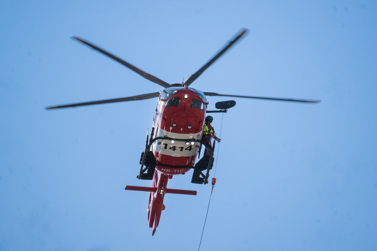 The new Airbus H 145 D3 based at the REGA base in Magadino in flight, during the REGA exercise involving the evacuation of the Monte Tamaro cable car, Rivera, Wednesday 18 March 2026..(KEYSTONE/Ti-Pre ...