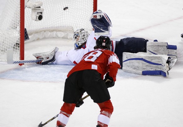 Phoebe Staenz (88), of Switzerland, scores a goal against South Korea&#039;s goalie Shin So-jung, of the combined Koreas team, during the second period of the preliminary round of the women&#039;s hoc ...