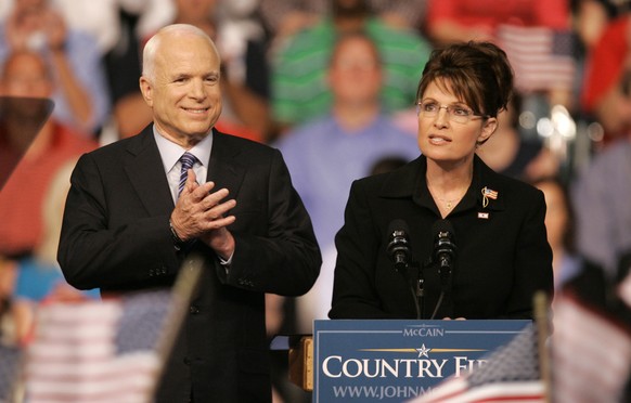 FILE - In this Aug. 29, 2008, file photo, Republican Alaska Gov. Sarah Palin delivers a speech as Republican presidential candidate, Sen. John McCain, R-Ariz., introduces her as his vice presidential  ...