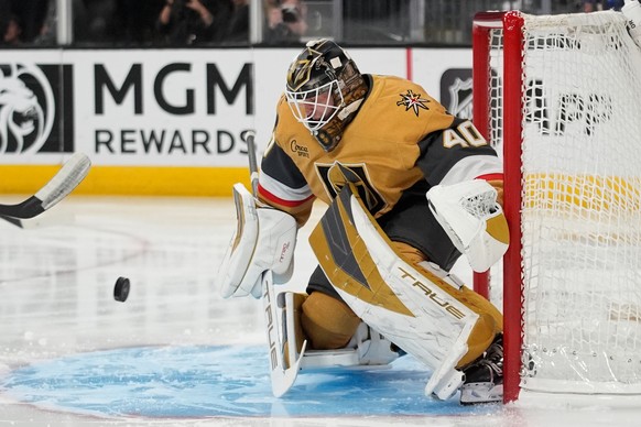 Vegas Golden Knights goaltender Akira Schmid makes a save against the Minnesota Wild during the first period of an NHL hockey game Friday, March 6, 2026, in Las Vegas. (AP Photo/John Locher)
Wild Gold ...