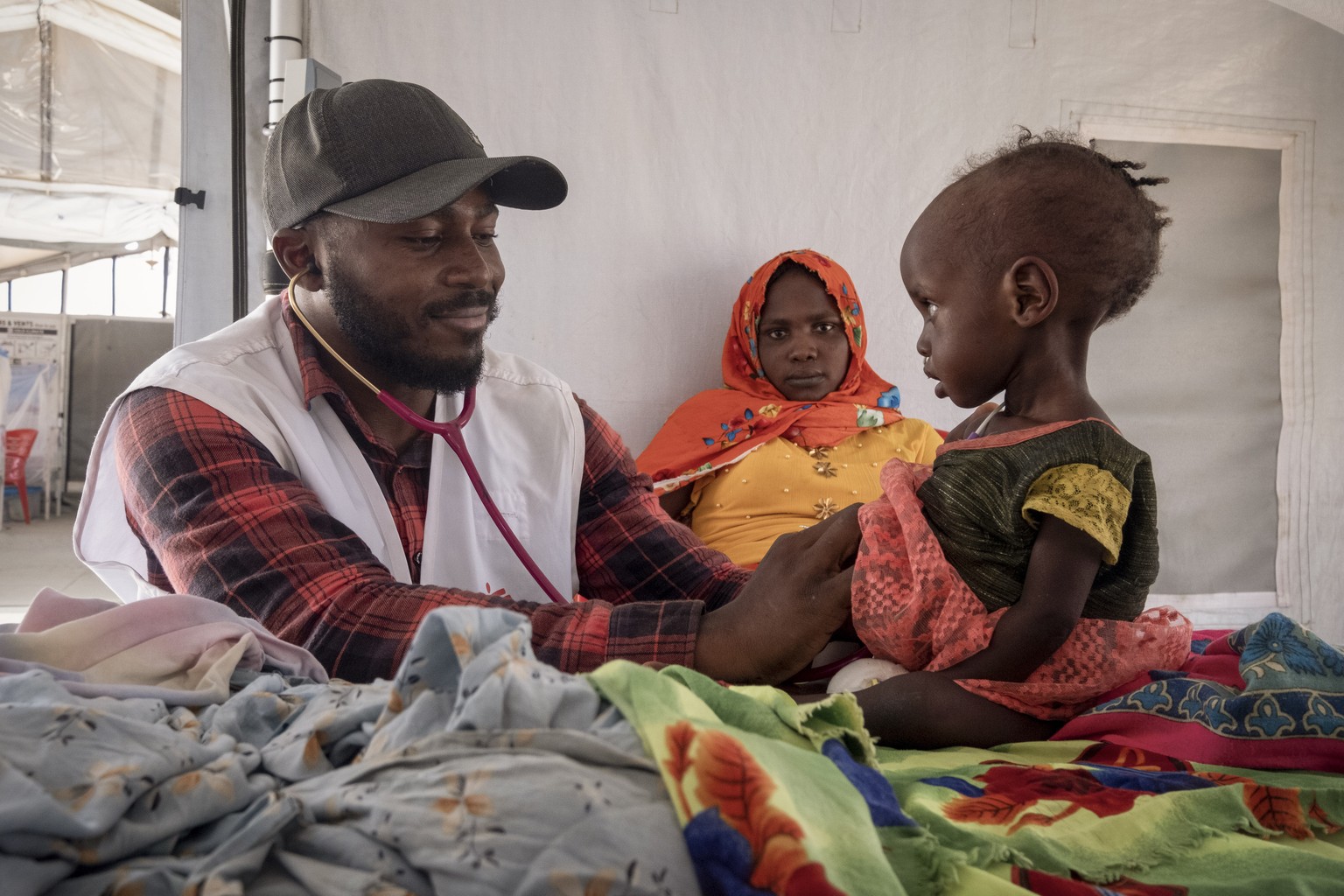 FILE - Sudanese Children suffering from malnutrition are treated at an MSF clinic in Metche Camp, Chad, near the Sudanese border, on April 6, 2024. The United Nations food agency warned Sudan?s warrin ...