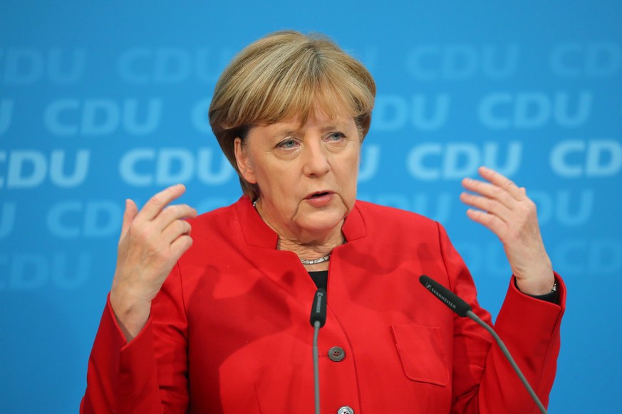 epa05639970 German Chancellor Angela Merkel speaks about her political future as CDU chairwoman and chancellor, during a press conference after the directorate meeting at the CDU headquarters in Berli ...