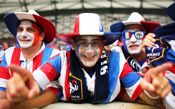 epa05367771 French fans pose before the UEFA EURO 2016 group A preliminary round match between France and Albania at Stade Velodrome in Marseille, France, 15 June 2016.

(RESTRICTIONS APPLY: For edi ...