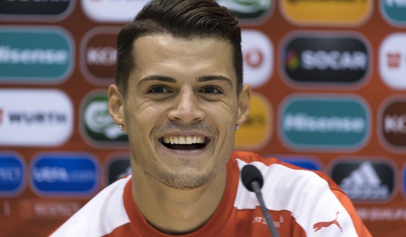 Granit Xhaka of Switzerland&#039;s national soccer team smiles during a press conference in the Estadi Nacional in Andorra La Vella, Andorra, on Sunday, October 9, 2016. Switzerland is scheduled to pl ...