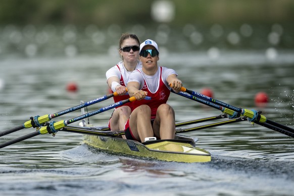 Jeannine Gmelin, front, and Nina Wettstein, from Switzerland at the Women&#039;s Double Sculls race at the World Rowing Final Olympic Qualification regatta on Lake Rotsee in Lucerne, Switzerland, Sund ...