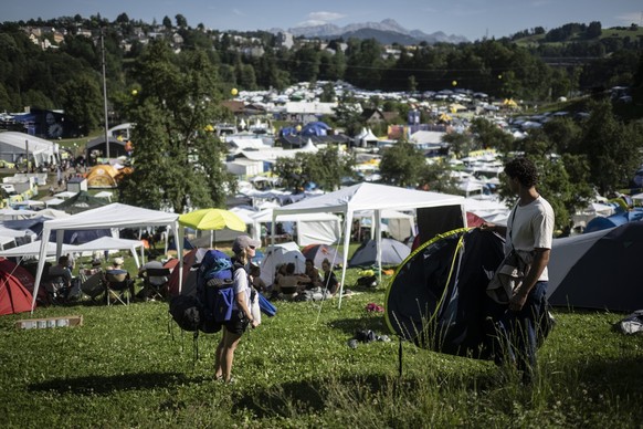 Visitors arrive at the Openair St. Gallen, on Thursday, June 30, 2022, in St. Gallen. The festival will take place until Sunday, July 3, 2022. (KEYSTONE/Gian Ehrenzeller)