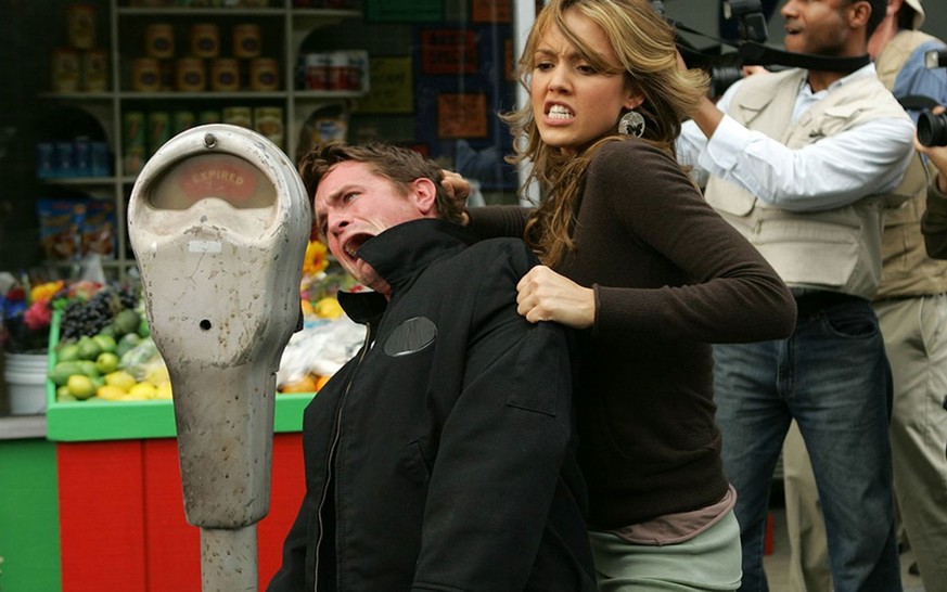 Jessica Alba beats up a paparazzo – a staged stunt for the promo campaign for the 2005 MTV Movie Awards.