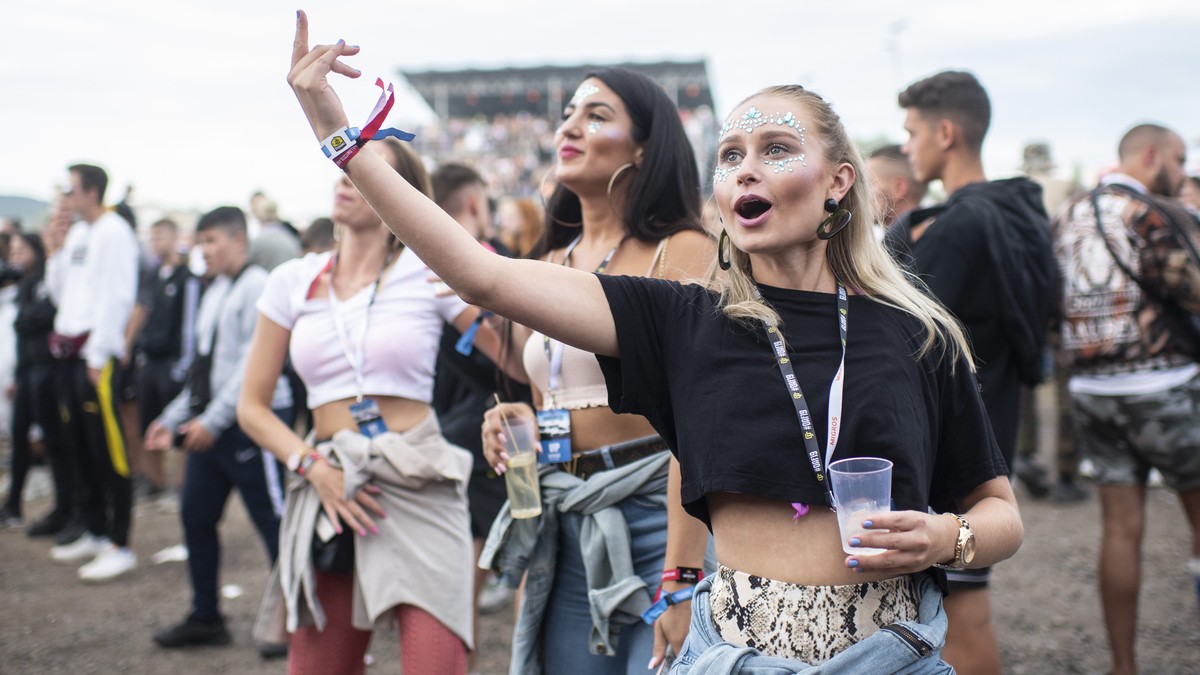 Festival visitors enjoy the show of American rapper Lil Baby during the Openair Frauenfeld music festival on Thursday, July 11, 2019, in Frauenfeld, Switzerland. The Openair Frauenfeld takes place fro ...