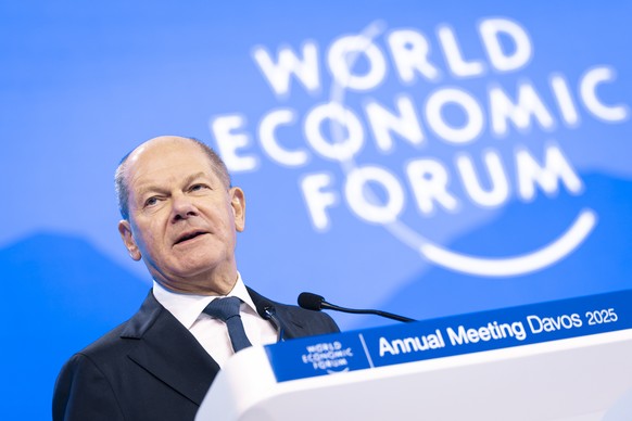 epa11842040 German Chancellor Olaf Scholz delivers a speech during a plenary session in the Congress Hall, during the 55th annual meeting of the World Economic Forum (WEF) in Davos, Switzerland, 21 Ja ...