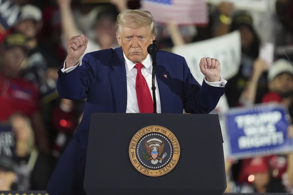 President Donald Trump dances after speaking at Macomb Community College, Tuesday, April 29, 2025, in Warren Mich. (AP Photo/Paul Sancya)
Trump