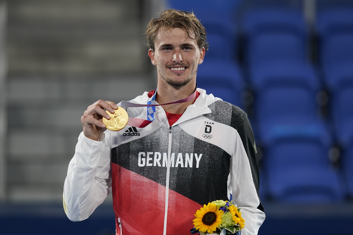 Alexander Zverev, of Germany, poses with the gold medal in the men's single of the tennis competition at the 2020 Summer Olympics, Sunday, Aug. 1, 2021, in Tokyo, Japan. (AP Photo/Patrick Semansk ...