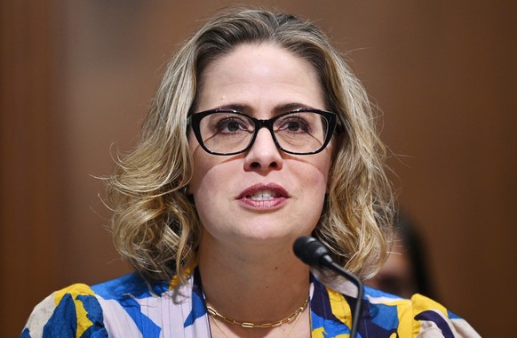 epa09532229 Senator Kyrsten Sinema, D-AZ, speaks during the Senate Finance Committee hearing on the nomination of Chris Magnus to be the next US Customs and Border Protection commissioner in the Dirks ...