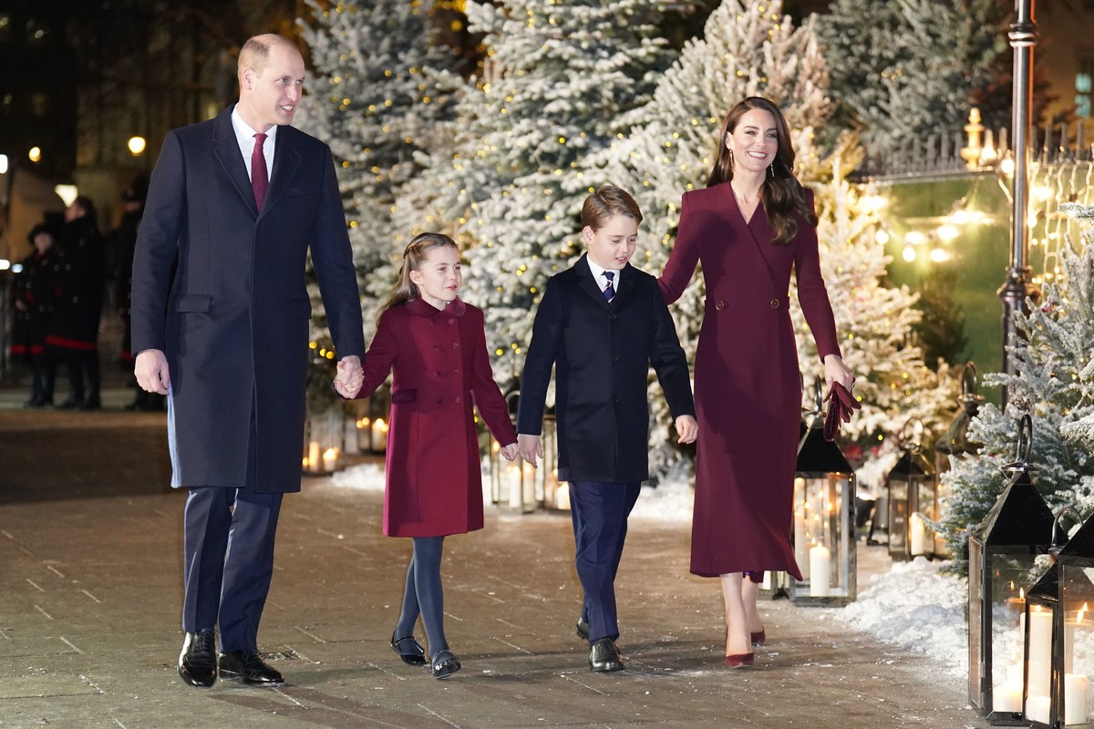 Britain's Prince William and Kate, Princess of Wales arriving with their children Princess Charlotte and Prince George for the 'Together at Christmas' Carol Service at Westminster Abbey ...